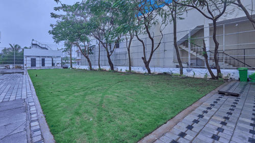 trees beside Rathas - the outdoor event venue at Grand Continent, Mahabalipuram